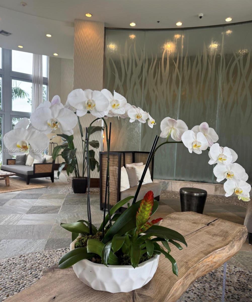 TAO SAWGRASS CONDOMINIUM - Residential Lease