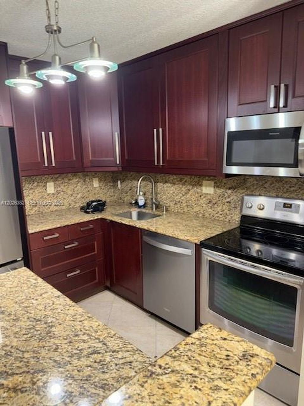 Photo of 7178 Ashmont Cir #108, Tamarac, FL 33321 (MLS # A12026352)