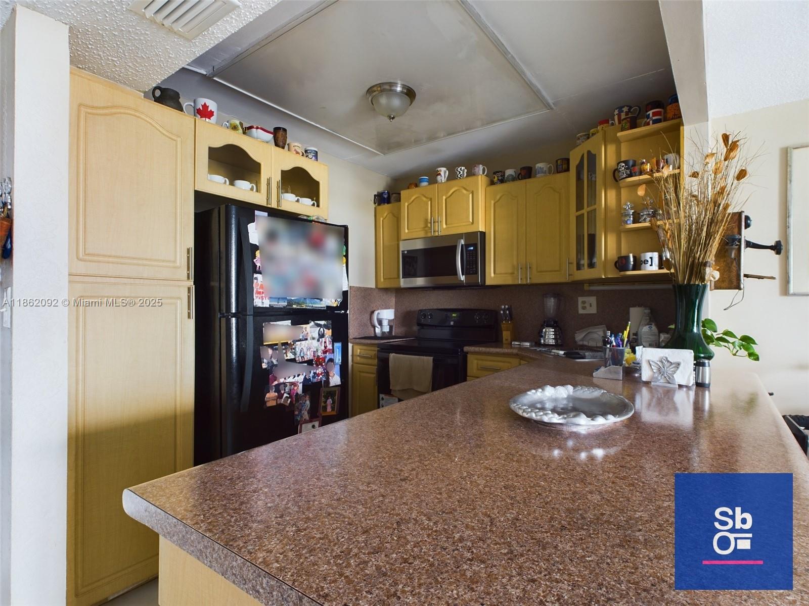 Beautifully condo unit at Bayview Towers condominium in 7th-floor residence featuring upgrade cabinets, countertops, and appliances. The tile flooring throughout ensures low-maintenance living. enjoy a spacious balcony with stunning city skyline views, perfect for relaxing with a book or entertaining guests. The building offers an array of amenities, including a library, community room, fitness center, billiards, and a resort-style pool with cabanas.