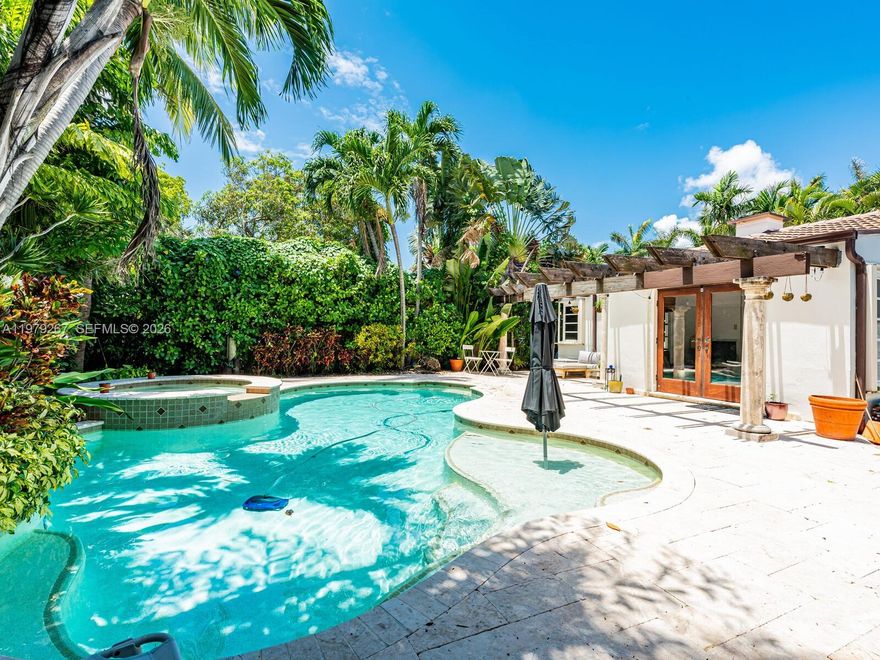 Rarely available, fabulous pool home with paved circular drive on a quiet street in Surfside. This 3 bedroom 2 bathroom home has tons of charm.  Living room has vaulted ceilings and fireplace.  Kitchen has granite countertops
and good cabinet space. Cozy den and Florida room too! French doors lead to a beautiful pool and spa with large private patio and beautiful landscaping. Walking distance to Surfside shops, Houses of Worship and world famous
Bal Harbour shops.  Property is also being offered annually at $ 7000.00 per month.