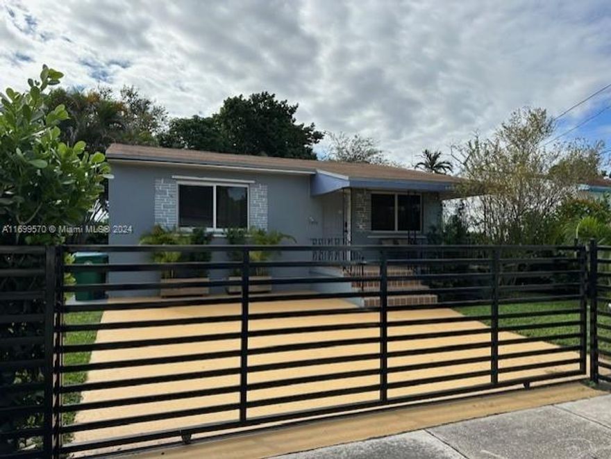 Just west of Buena Vista is this quiet well maintained residential neighborhood. Excellent location with easy access to I95 express lanes ( 3 blocks ) University of Miami Health Campus 2 miles and downtown Miami 4 miles. House is 3 bedroom 2 bath with nicely landscaped fenced backyard. New roof, updated kitchens and baths, washer and dryer. Front porch, off street parking and fence in front of property. Tile floors, concrete block construction.