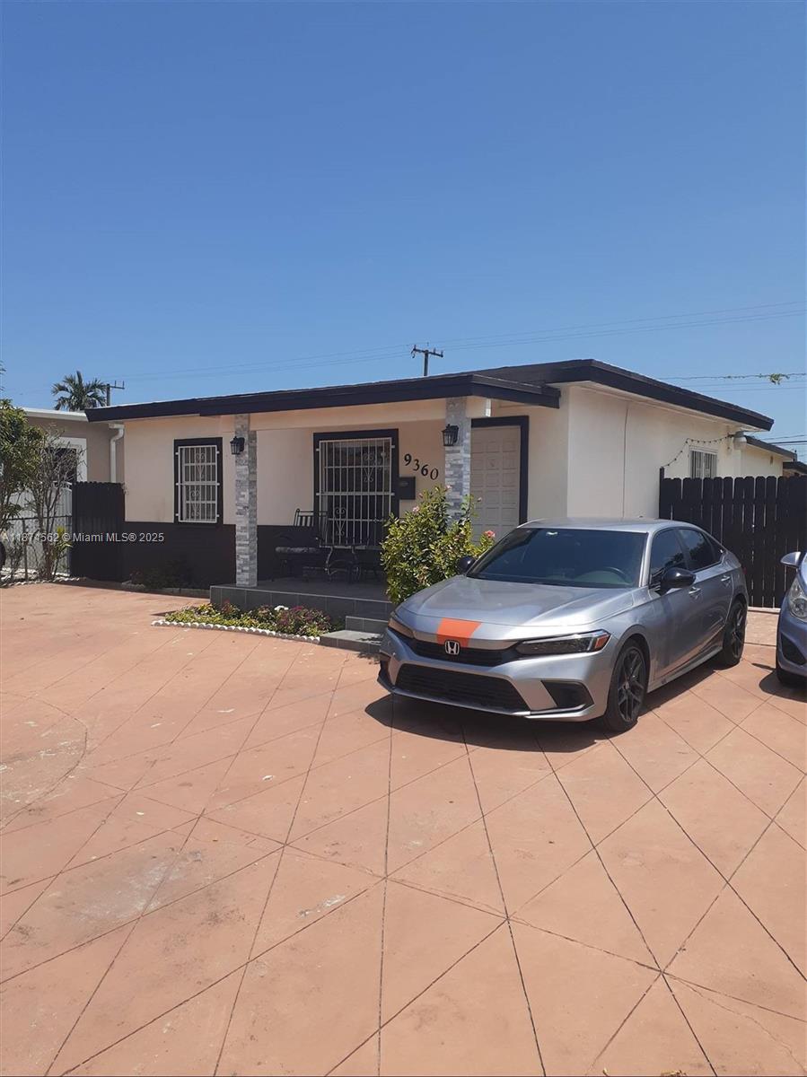 Investor special in Central Heights! BRAND NEW ROOF! Multifamily property with 3 units on a 7,000 sq. ft. lot plus RV available for sale. Owner will remain in main 2BR/2BA unit for 1 year as a tenant, offering immediate rental income. Property features 4 bedrooms, 4 baths, open floor plan, walk-in closets, and a mix of central, wall, and window A/C. Two other 1BR/1BA units are both occupied on month to month leases at $1000 each per month. Exterior highlights include fenced yard, fruit trees, mature landscaping, and parking for 3+ vehicles. Built in 1950, this income-producing property combines charm, functionality, and strong rental potential in a prime Miami location.