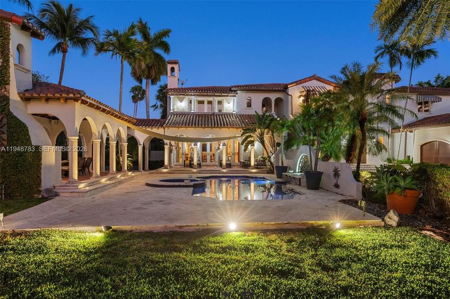 Stunning Spanish Villa, a rare opportunity to enjoy the exclusive, guard-gated Hammock Oaks community, featuring double slips and a 75’ boat dock with water and electric, offering direct ocean access to Biscayne Bay. This distinctive residence showcases timeless Spanish architecture throughout, with grace and elegance. Highlights include soaring ceilings, marble and wood flooring, exquisite millwork, and authentic Spanish stone and tile accents. Formal living and dining rooms set the stage for refined entertaining. The newly renovated gourmet chef’s kitchen is equipped with top-of-the-line appliances and opens seamlessly to a spacious family/media room. The lavish primary suite offers a private balcony with serene views. Outdoors, lush landscaping surrounds an expansive patio and gazebo with built-in grill, half-court basketball and sports court, creating true resort-style living.A three-car garage with interior car lift, plus additional covered car parking, completes the property. The home is equipped with a permanent whole-house standby generator a commercial-grade Generac system with automatic transfer switch, providing seamless backup power during outages. A truly magnificent masterpiece.