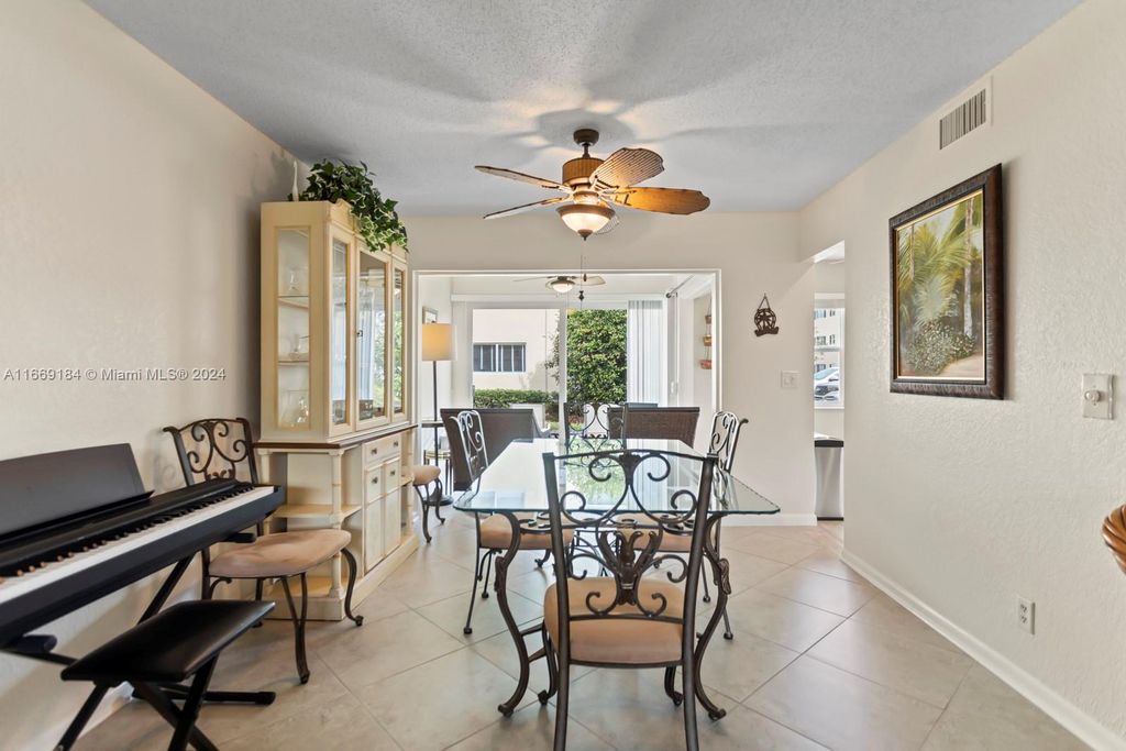 Photo of 19 Colonial Club Dr #103, Boynton Beach, FL 33435 (MLS # A11669184)