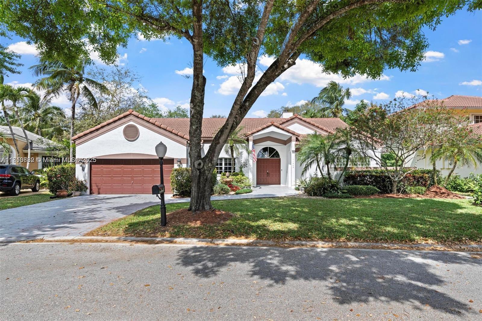Beautifully updated 4-bed, 2.5-bath pool home tucked away in the gated East Landing section of Rock Creek. Located on a quiet cul-de-sac, this immaculate residence blends elegance and comfort. Featuring volume ceilings, new flooring, marble fireplace and fresh paint throughout. The remodeled kitchen shines with quartz countertops, custom cabinetry, new appliances + washer/dryer. The split floor plan offers a private primary suite with direct access to the backyard oasis—complete with a heated saltwater pool, spa, new pump & lush landscaping. Full hurricane shutter protection and roof in great condition. Enjoy peaceful outdoor living and entertaining year-round. Zoned for top-rated schools, close to shopping, dining, and parks. This centrally located, move-in ready gem is truly a rare find!