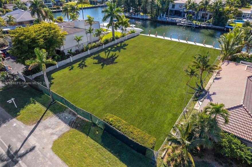 Golden Isles waterfront lot on deep-water w/no fixed bridge & ocean access. Southern exposure with sunrises and sunsets, beautiful views not facing any condos and perfect for large vessels on its protected no wake wide canal. The property is situated on one of the best streets in the community, a quiet cul-de-sac street and canal with no thru traffic. Located in the private gated waterfront community of Golden Isles, centrally located between Miami and Ft. Lauderdale and close to The Shops of Bal Harbour and the Aventura Mall.