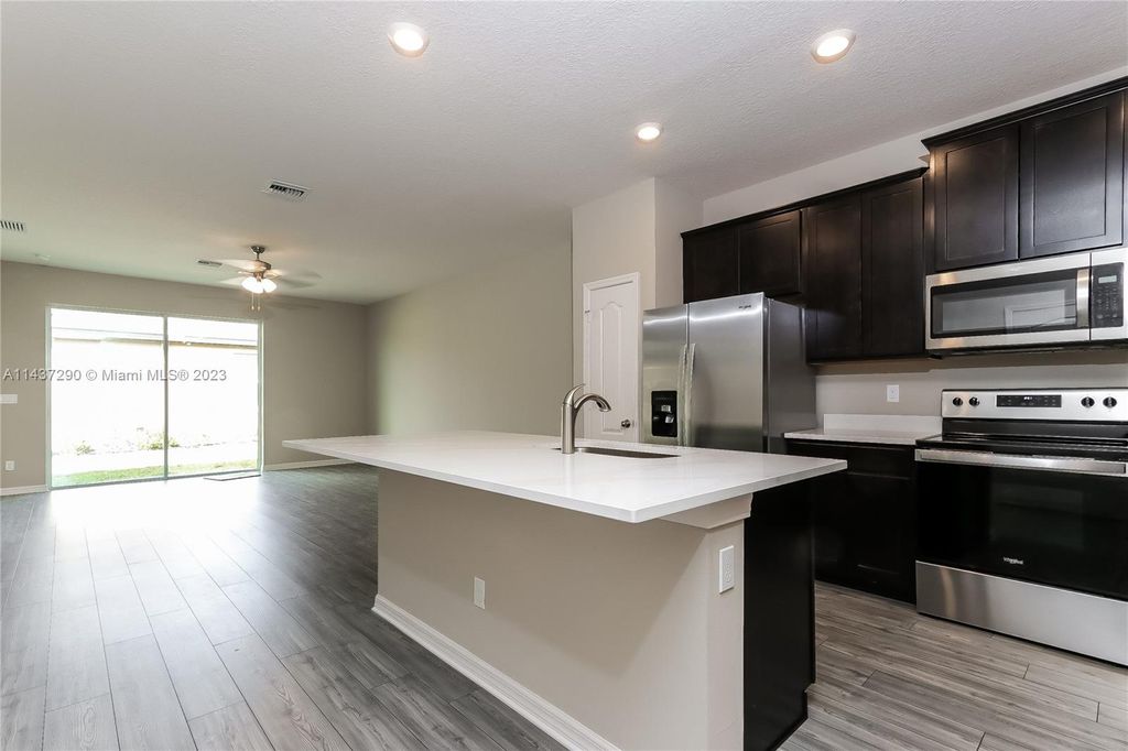 Photo of 1708 Celebration Dr, Fort Pierce, FL 34947 (MLS # A11437290)