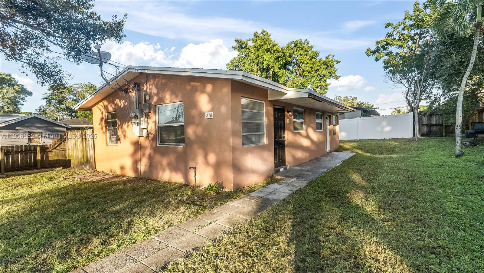 View photos, virtual tours, details... 218 NW 8th Ave