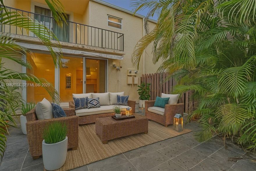 Back on the market, massive price adjustment! Act now before it's gone! Can be rented immediatly, yielding high returns! Discover the potential of this 2/2.5 townhome in the desirable Three Islands Venetian West Community. Meticulously maintained, key updates: new roof (2024), impact windows & doors, new refrigerator, newer A/C, new flooring 2nd floor, freshly repainted, new window treatments, resurfaced front and back patios, new outdoor motorized awning. Best PRIME location - the spacious fenced backyard opens directly to Three Islands Park, playgrounds, basketball courts, and scenic walking trails.  Community amenities include a pool, tennis courts, and a clubhouse. Maintenance includes internet, cable, and water—seller pays off the remaining assessment in full. Ideally located minutes from beach, shopping, dining, and airports, this townhome is a rare blend of peace of mind and potential, ready for its next chapter with you!