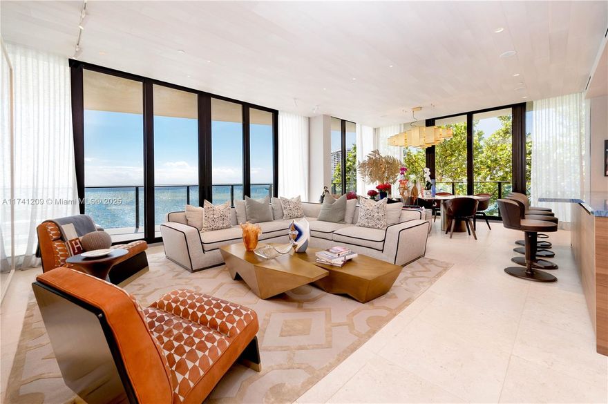 Welcome to a one-of-a-kind 4-bedroom residence at The Fairchild, Coconut Grove, where luxury and exclusivity converge with timeless design. Enjoy breathtaking views of Biscayne Bay and the lush Grove canopy from the living and dining areas, kitchen, and private balcony—creating a serene retreat. This residence boasts custom wood tongue-and-groove ceilings, elegant wallpaper, and sophisticated wood paneling, crafting a refined ambiance. The unit features Leandro Mora custom cabinetry & millwork, Bosch appliances, and quartz countertops. A Crestron smart home system and dual AC units with UV light filtration provide modern comfort. Enjoy 24-hour security & valet service, along with top building amenities.