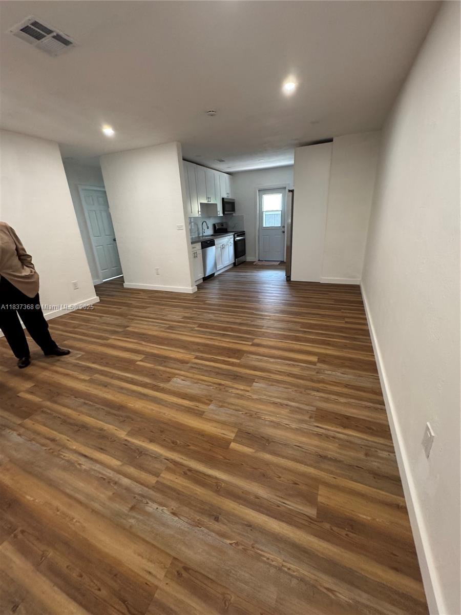 Remodeled 2/1 in central location, close to coral gables. This 2/1 has 2 private parking spaces, covered terrace and private backyard, new flooring, new lighting, new kitchen and bath. Ready for July 15th. Bedrooms have walk in closets. Shared new washer and dryer.