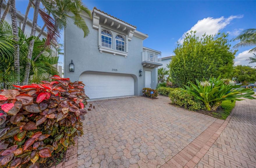 Welcome to this bright and inviting 3-bedroom, 2.5-bath home in the prestigious gated community of Aventura Lakes. Enjoy serene lake and fountain views from over 2,200 sq. ft. of living space. Features include tile floors downstairs, wood floors upstairs, a spacious primary suite with custom walk-in closet, and built-ins in all bedrooms. Full-size laundry room. Resort-style amenities include two pools, gym, and more, with 24/7 security and on-site management. Prime location near Chabad, Charter Sofer High School, top schools, shopping, dining, and beaches.