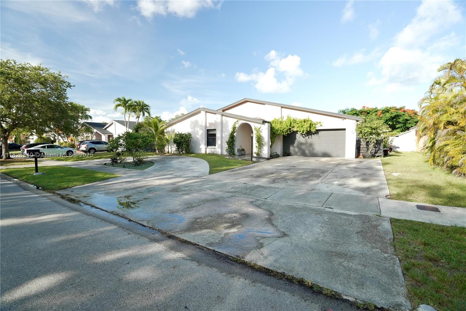 Rare Home in The Crossings. spacious, single-level 5-bedroom, 4-bathroom home situated on a generous 9,900 sqft. lot with 3,642 total square feet of living space. Offered as-is, this unique property features a smart, flexible layout designed for everyday living and entertaining. You’ll find a bright kitchen that opens to a spacious family room, a large living room, dedicated office space, a separate playroom, and a spacious patio perfect for outdoor gatherings. The primary suite includes two walk-in closets, offering plenty of storage and comfort. The home is fully solar-powered and backed up by FPL, with solar panels covering 99% of all electricity usage. Clubhouse with gym, Basketball, tennis/racquetball/pickleball courts, swimming pool, Multiple satellite pools. Scenic lake with trails.