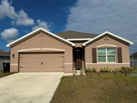 Photo of 517 SW Lacroix Ave, Port St Lucie, FL 34953 (MLS # A11923531)