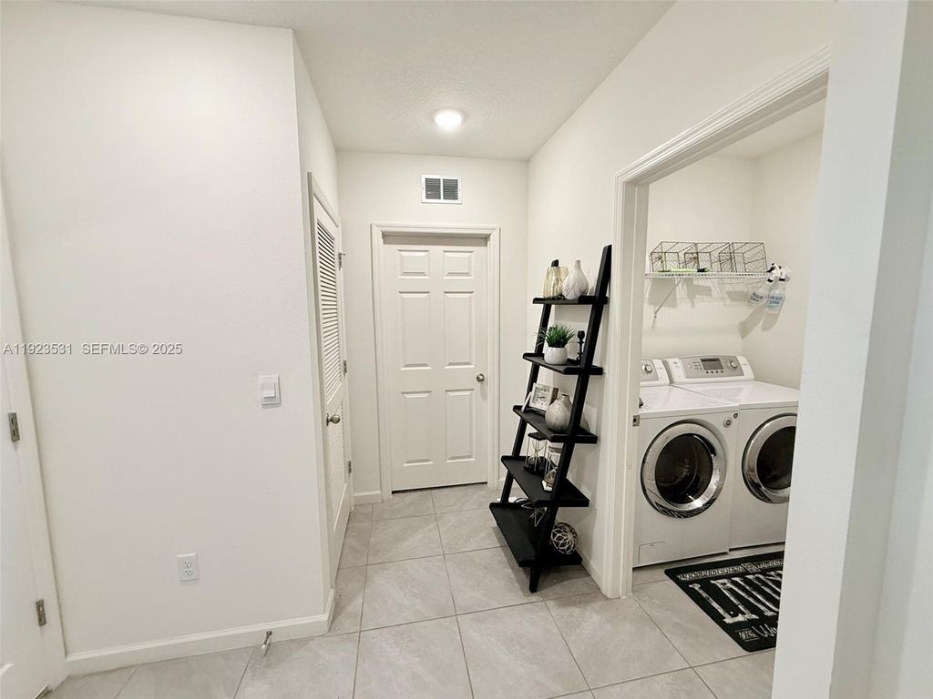 Photo of 517 SW Lacroix Ave, Port St Lucie, FL 34953 (MLS # A11923531)