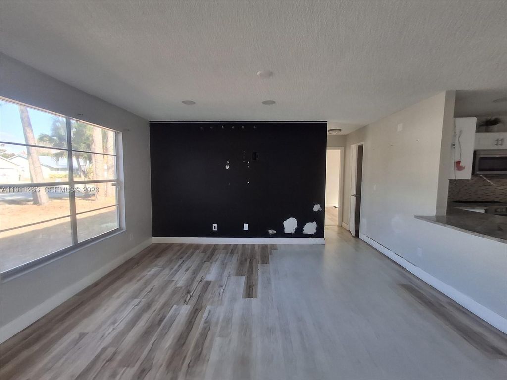 Photo of 1581 SE Sutton St, Port St Lucie, FL 34983 (MLS # A11911283)