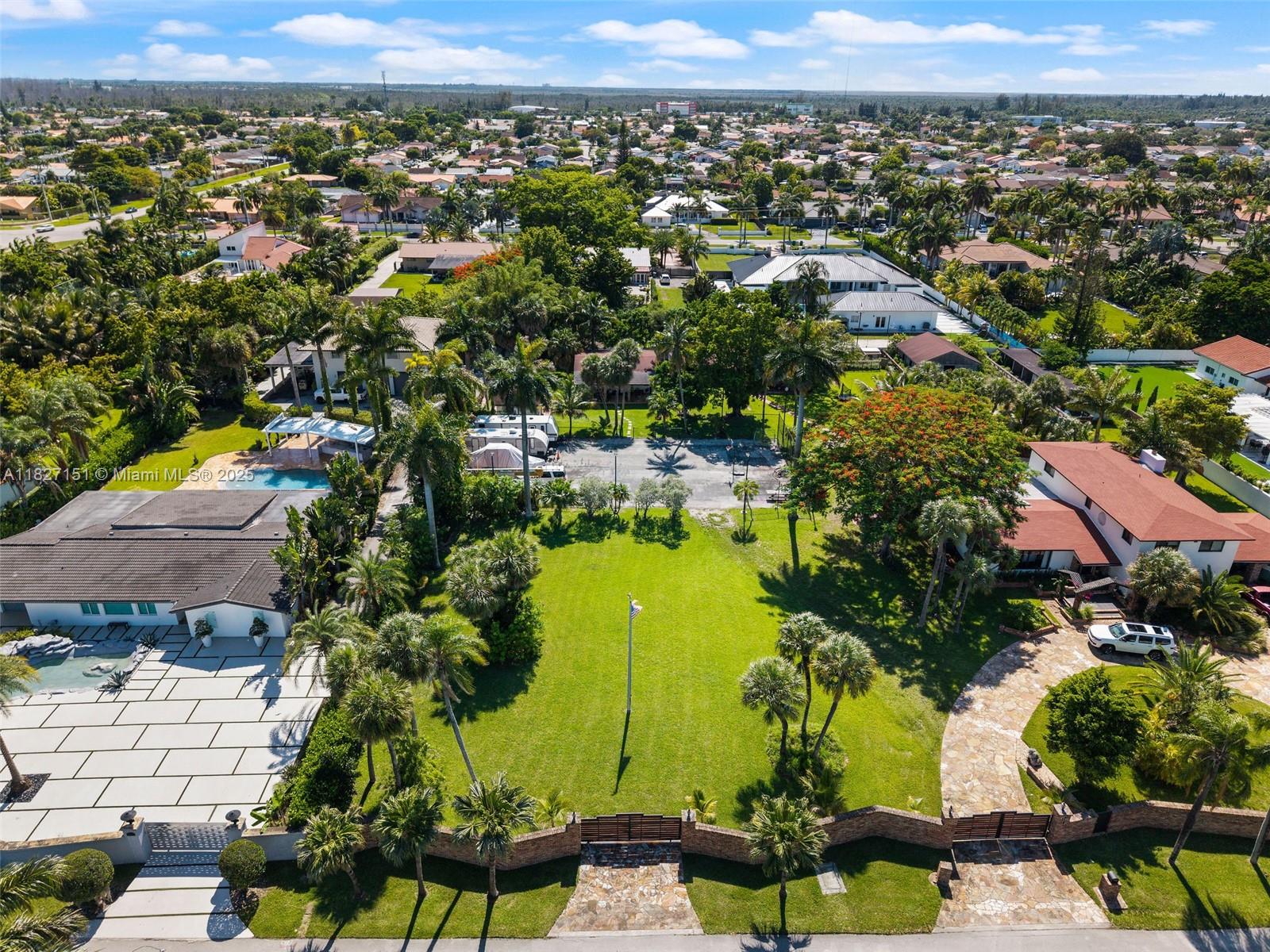 Endless possibilities await on this incredibly diverse property situated on an expansive 34,000+ sq ft lot. Whether you're looking to build your dream estate from the ground up or invest in a future development, this rare opportunity offers unmatched flexibility. The existing home is perfectly livable, ideal for immediate occupancy or rental income while you plan your vision. With this much land, there's room to create something truly special, expand, build new, or hold as a long-term investment. A blank canvas with endless upside in a prime location.