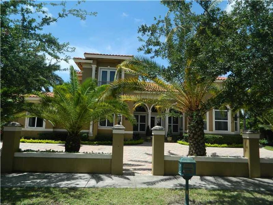 Custom build luxury home build in 2007. Perfect setting for living and entertainment. Elegant 5 bedroom, 4.5 bath, formal living room, family room, theater/bar room, office with private entrance, master bedroom with his and hers walk in closet. A resort s tyle pool with paved patio throughout. This warm and inviting home sits on a 17,100 sq/ft lot.