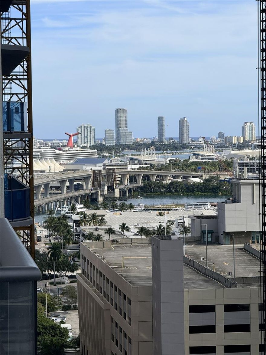 Elevate your lifestyle in this beautifully curated, fully furnished 1 bedroom residence at The Crosby at Miami Worldcenter. Enjoy Miami Port views or breathtaking sunset skyline vistas from your private balcony. The unit features Bosch appliances with a one-year warranty, a smart TV, in-unit washer and dryer, automatic blinds, and smart lock technology allowing controlled access—ideal for short-term rental use. Floor-to-ceiling windows provide abundant natural light, complemented by a thoughtfully designed layout that blends comfort and modern style. Internet is included in the HOA, and pets are welcome. The building offers two full floors of resort-style amenities designed to enhance guest experience and occupancy rates, including a state-of-the-art fitness center, spa, movie theater, coworking stations, conference room, game room, lounges, and 24/7 concierge service. Located in the heart of Miami Worldcenter—one of the city’s fastest-growing districts—Steps from Kaseya Arena, Brightline Station, and Bayside Marketplace, just minutes from dining, entertainment, shopping, the waterfront, and Port of Miami. Strong rental demand and turnkey setup make this an excellent income-producing opportunity. Schedule your private showing today.