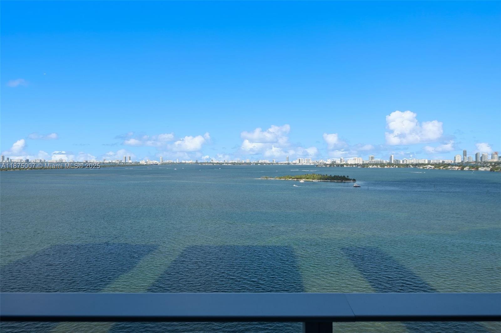 Luxury condo on the 45th floor of Aria Reserve with breathtaking panoramic views of Biscayne Bay! This never-lived-in 1 Bedroom + Den, 2-bath residence features elegant modern design, expansive living areas, and floor-to-ceiling windows that showcase stunning city and bay vistas. The unit is upgraded with glass shower enclosures, LED-lit mirrors in all bathrooms, and designer curtains in the primary bedroom and living space. Located in a premier waterfront tower, Aria Reserve offers unmatched resort-style amenities: private sports marina, spa, tennis, paddleball, squash and basketball courts, mini golf, a dog park, and two pools with water views—including a semi-Olympic pool. Experience elevated living in Miami’s most iconic high-rise.