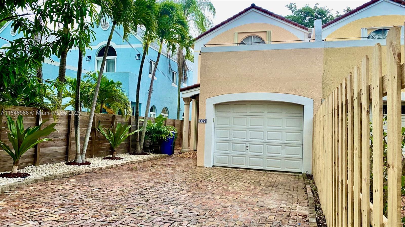 Freshly painted and spruced up 3-bedroom, 2.5-bath townhome with a private pool in the heart of Center Grove is a must-see! Located near CocoWalk, top-rated schools, lush parks, and Biscayne Bay, the home offers the perfect blend of style and convenience. Featuring marble and wood floors, the open living space flows seamlessly into a spacious kitchen with stainless steel appliances and a gas range. The light-filled family room opens to a covered porch and a private backyard oasis with pool. Upstairs, you'll find two well-sized bedrooms and a generous primary suite with walk-in closet and private terrace. The property is fully fenced with an electric gate and includes a one-car garage. Location, location!!