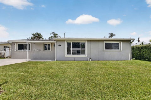 Photo of 7521 Eaton St, Hollywood, FL 33024 (MLS # A12071432)
