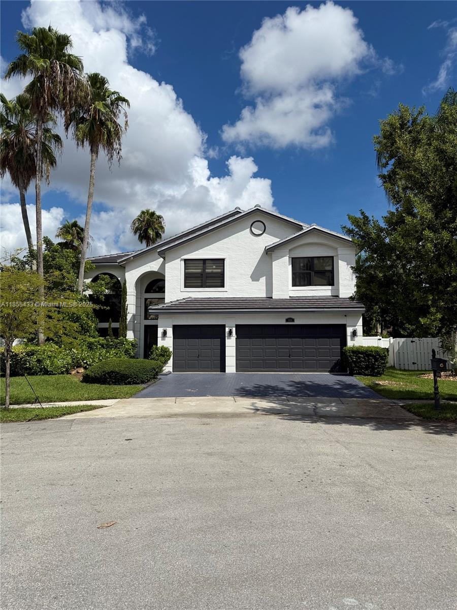 This gorgeous home features a newer roof and impact windows (2023) for your peace of mind. The kitchen has quartz countertops, stainless steel appliances, and a spacious island that’s perfect for hosting guests. Upstairs, you’ll find four bedrooms. On the first floor there is a full bedroom and bath perfect for guests. The primary suite is HUGE and offers a peaceful retreat with dual walk-in closets, and a relaxing bath. Step into your expansive backyard fully fenced with a covered pergola, twinkling garden lights, and endless space for play, gardening, or gatherings under the stars. Enjoy the comfort of a guard-gated community with 24/7 security.
Note: Current property taxes reflect a PACE loan, will be paid at closing, resulting in a tax reduction.
Schedule a private tour today!