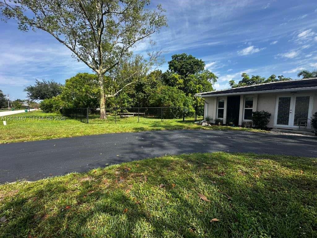 Photo of 11901 NW 25th St, Plantation, FL 33323 (MLS # A12018467)