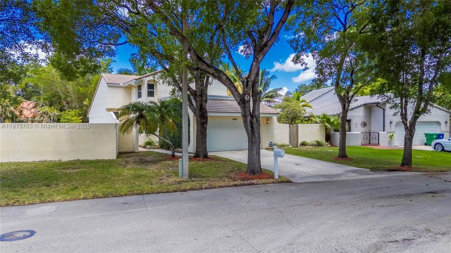 Unique home in desirable Rock Creek! This upgraded 4 bed, 3 bath residence features solid oak floors, soaring cathedral ceilings, and stunning lake views. Enjoy a sun-filled kitchen overlooking the pool deck and a winter garden-style sunroom. The private backyard oasis includes a pool, grill area, and lake access for kayaking or fishing. Upstairs, the primary suite offers a spa-like bath and shares a balcony with a guest room. One bedroom and full bath on the main level. Impact windows throughout, 2-car garage, quiet street near parks, schools, and shops. A rare find that combines comfort, style, and location. This home is in a prime location near schools, shopping, restaurants, and more! Don't miss out on this home.