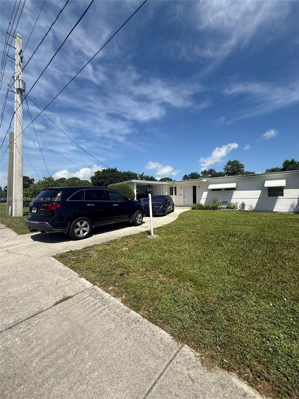 Photo of 157 NE Prima Vista Blvd, Port St Lucie, FL 34983 (MLS # A11872842)