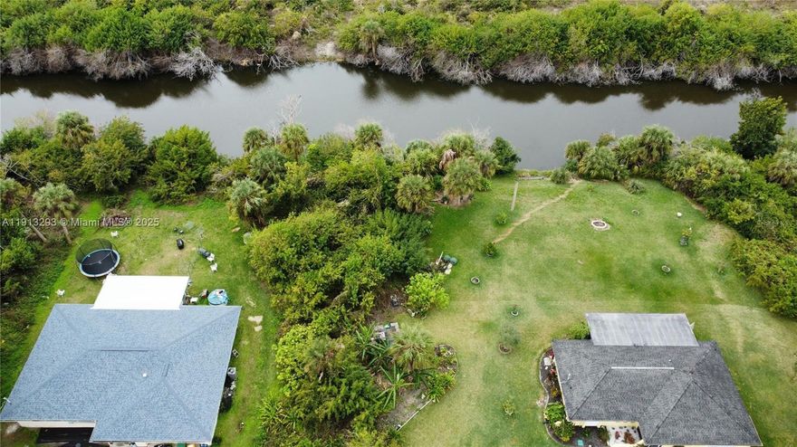 Nestled in a prime location, this breathtaking water view lot offers the perfect blend of tranquility and natural beauty. Ready to build your dream house add a dock and have access to the canal.