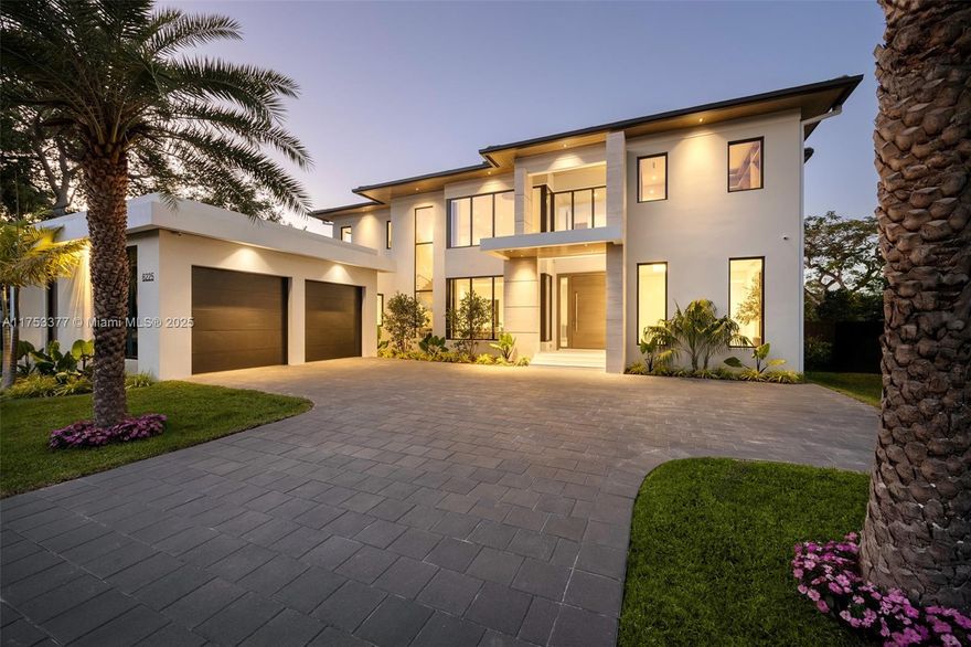 Set in prime South Miami location is this extraordinary 2025 tropical modern 7,827 total sq. ft. home on oversized 16,400 sq. ft. north/south deep lot with extra-large garden. High end finishes including Italian ITALKRAFT kitchen/closets, Dekton countertops, Sub-Zero/Wolf appliances & dual kitchen islands/dishwashers. Interior features include invisible hinge doors with magnetic locks, Lutron lighting system, up/down bar stations, natural light dual master closets and office/gym. High efficiency A/Cs, high res. security cameras/ADT alarm, Cat-6 prewired system, and city natural gas connection. Love the resort-style salt water heated pool, custom stainless steel summer kitchen with 1,000 sq. ft. of covered terrace and cabana bath. Minutes from top private schools, restaurants and shopping.