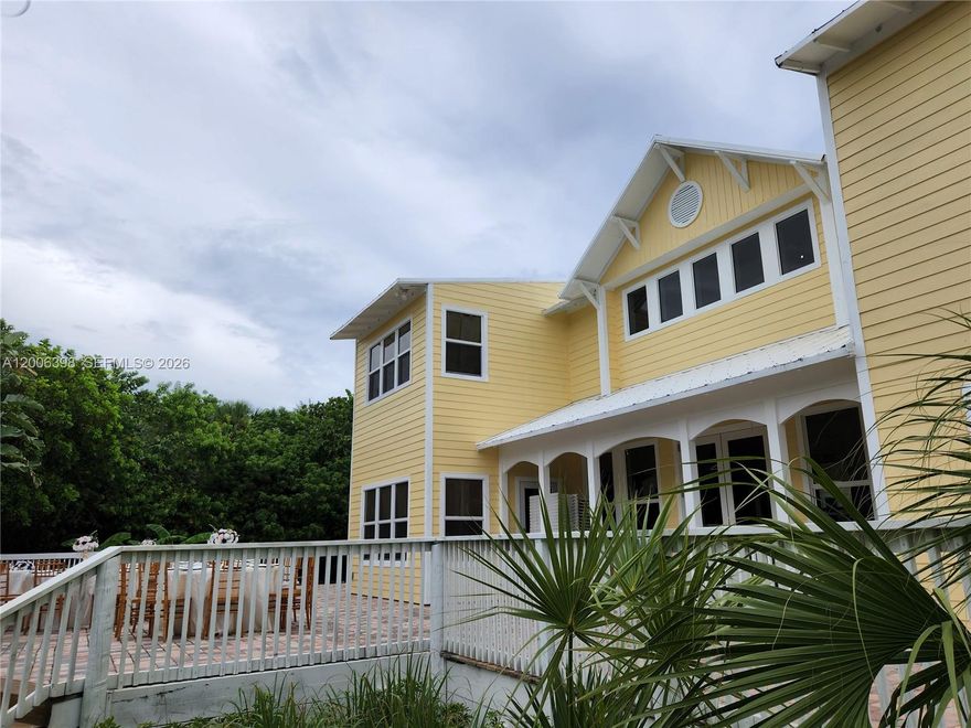 Unique One of a Kind Beach House for Sale! Welcome to this beautifully remodeled beach home featuring 6 spacious bedrooms, each with its own private ensuite bathroom,+ a convenient half bathroom downstairs. The home also has 2 other versatile rooms, perfect for an office, extra bedrooms or a home gym.  Enjoy peace of mind with brand-new impact windows and doors, delight in the elegant dining room and chef’s kitchen ideal for family gatherings. Natural light fills every room, creating a bright and welcoming atmosphere. On a cold winter you can snuggle with your family in front of the fireplace in the spectacular great room featuring 20ft ceilings and an elegant chandelier. Nestled on an expansive waterfront corner lot of over 28,000 square feet, this property boasts a private boat dock, perfect for water adventures & fishing, and is located in the serene town of North Hutchinson Island.  Enjoy the breathtaking sunset on the Lagoon while lounging on your back porch, have cocktails as you listen to the waves from your 2nd floor oceanfront deck, and a romantic walk on the beautiful white sandy beach just steps away. The home boasts a large patio great for entertaining and parties. The beach house is also licensed as a Bed & Breakfast and A Special Events Venue for Weddings & Private Parties. The home also has a 2 car garage as well as a parking area that can accommodate up to 17 cars. Play a game of volleyball, pickleball or tennis at the courts across the street at Pepper Park.