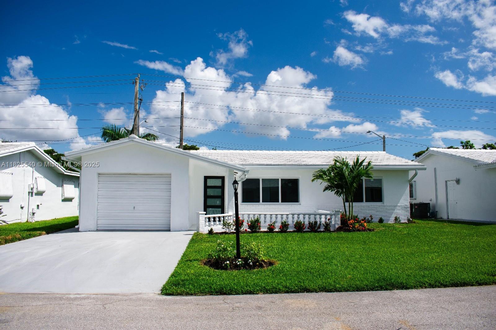 Completely remodeled inside and out. All new appliances, refrigerator produces CRAFT ICE, ice & water dispenser in door, tankless/endless water tank, lighted faucets, retractable ceiling fans, NEW BLINDS, ROOF replaced 2024, new landscaping, open concept, same tile throughout entire house, FINISHED garage w/ cabinets, garage door opener, key less front door entry, NEW IMPACT WINDOWS, NEW FRONT and back STORM doors, new stove, microwave, dishwasher, new canister lighting in whole house AND garage, new kitchen counter granite countertops, farm sink, 1/2 horse (soft quiet) disposal. Newly painted driveway, exterior interior walls and ceilings. AMENITIES – GOLF COURSE FREE to residents, 2 pools, hot tub, exercise room/equipment, clubhouse, pool tables, ping pong.