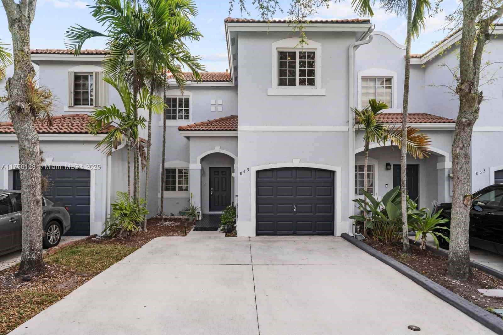 Beautiful townhouse in the desirable Emerald Lakes community. Enjoy great natural lighting in the living and dining rooms. The floors are tiled downstairs and laminate upstairs. This unit boasts a spectacular lake view from the master bedroom and features a private patio with a partial lake view. It has been freshly painted and includes new air conditioning unit, installed a month ago. Both levels are protected with impact windows & doors. The well-maintained community offers phone-in security access, a clubhouse with a pool and play area, and security patrol on premises. Located near the best schools and neighborhoods Miami has to offer and within walking distance to Tamiami Park and ride. Newly paved asphalt throughout the condominium. Must see!