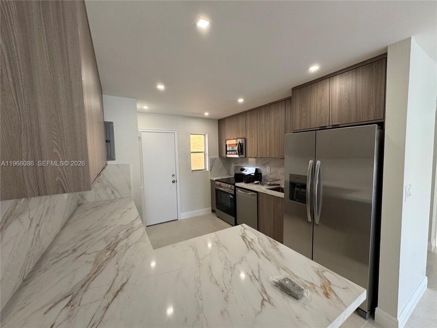 NEW, NEW, NEW, just remolded - No expense spared, be the first to living in this newly remodeled designer unit, completely new kitchen, bathrooms, floors, built-in closets and LED lighting throughout. Best unit in the building! Located just minutes from the Westland Mall, City Park, highway and more.