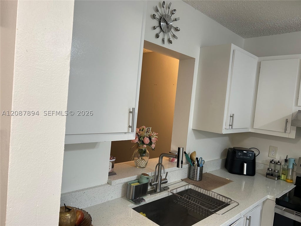 Photo of 7840 NW 50th St #209, Lauderhill, FL 33351 (MLS # A12087894)