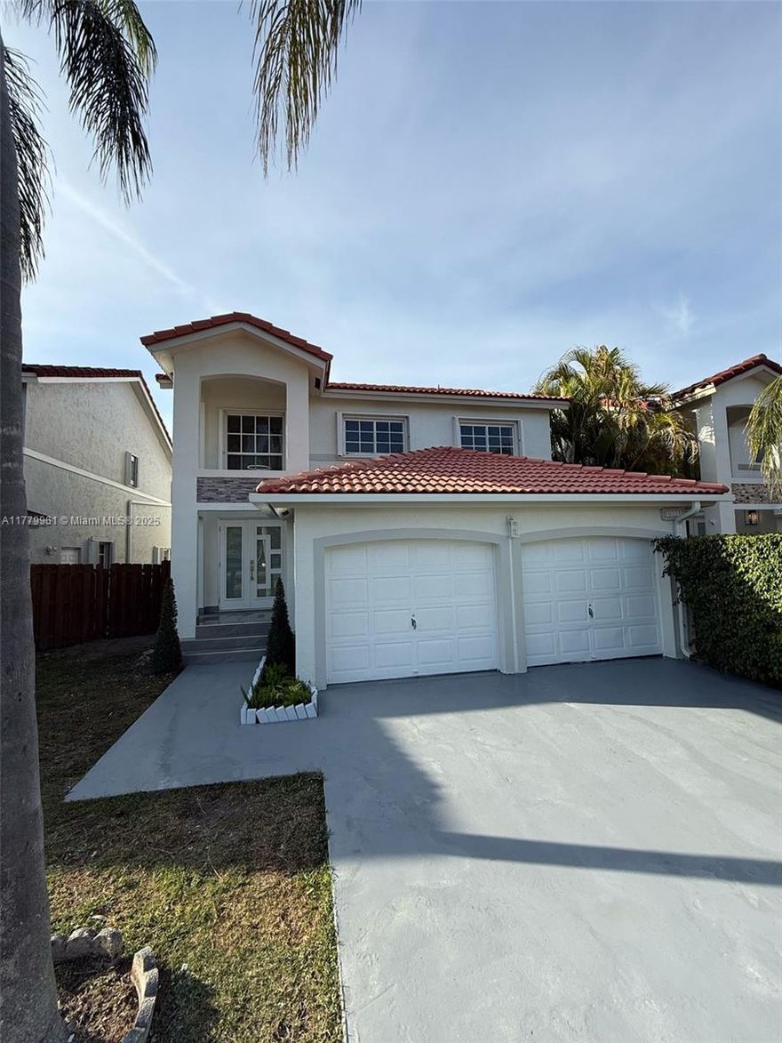 Welcome to Your New Home!
Fully remodeled 4-bed, 2.5-bath home with a sleek open-concept layout connecting kitchen, dining, and living areas. The kitchen shines with brand-new, top-tier appliances, and the bathrooms offer modern finishes and smart toilets for extra comfort.

Enjoy a partially covered wooden patio, perfect for relaxing or entertaining. This home also features accordion hurricane shutters, impact-resistant doors, and a new central A/C system.

Located in a highly desirable area, with access to resort-style amenities: clubhouse, pool, jacuzzi, kiddie pool, tennis & basketball courts, and playground.

Move-in ready—offering style, safety, technology, and an unbeatable location.