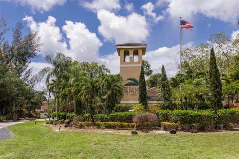 Photo of 400 Palm Cir W #102, Pembroke Pines, FL 33025 (MLS # A12015236)