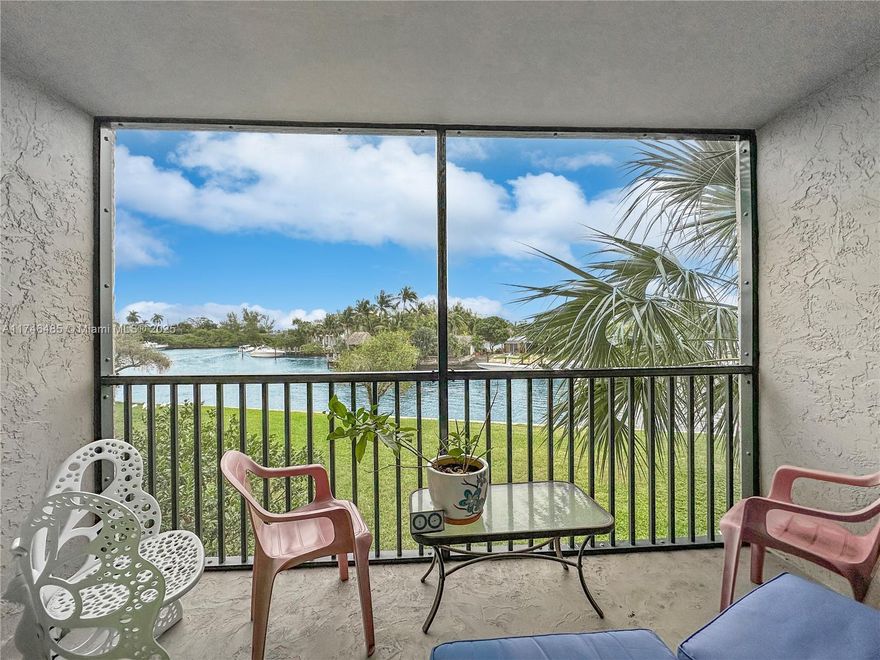BEST PRICE IN BOCA BAYOU! And the best building too. Spectacular water views as far as the eye can see! Incredible features abound including tile floors throughout, wonderful open floorplan with fantastic views from the kitchen sink all the way to the canal, a fantastic master bath, incredibly spacious bedrooms and ample walk-in closets. Easy in, easy out 2nd floor unit with an elevator makes life a breeze. Building 13 is the best with rentals allowed 1x/year for as short as 3 months. The perfect blend for personal use and investment! Boca Bayou has everything, state-of-the-art fitness center, 5 pools, shuffleboard courts, a great putting green, tennis courts, boat slips & more. Fully gated and secured with 24/7 security and on-site management. Just a wonderful place to own. Call today!