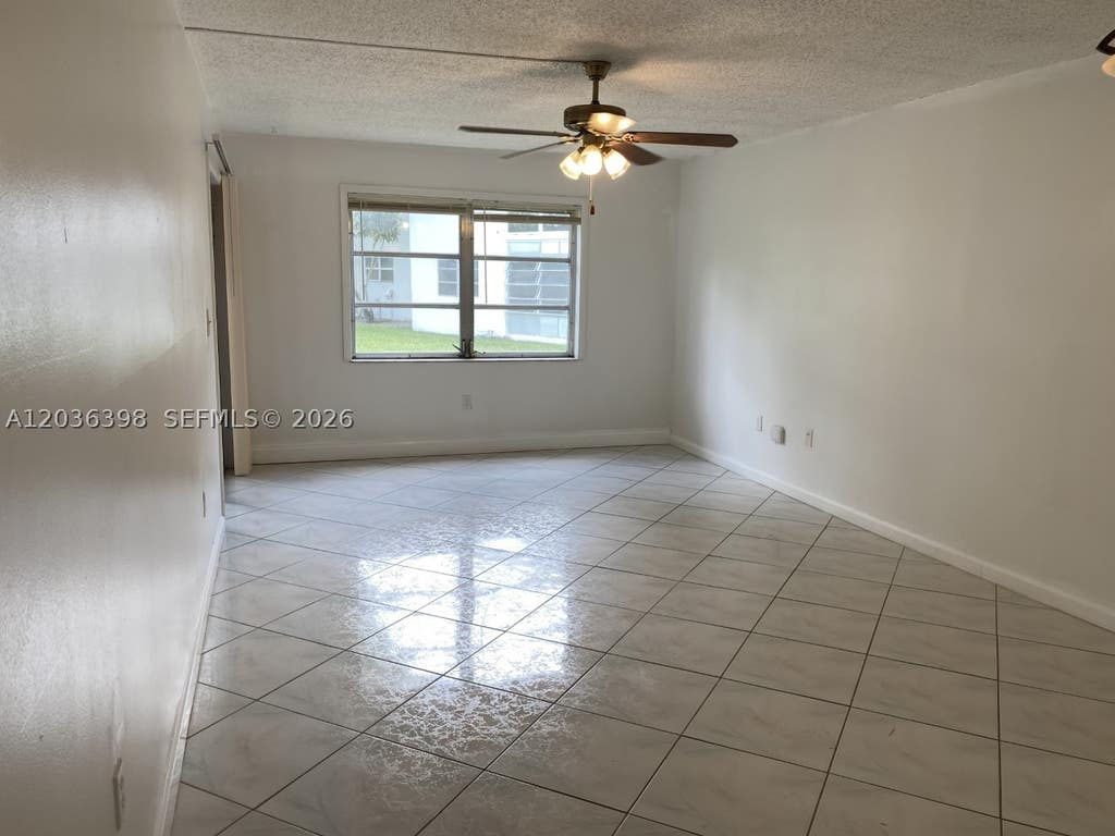 Photo of 6507 Winfield Blvd #126-C, Margate, FL 33063 (MLS # A12036398)