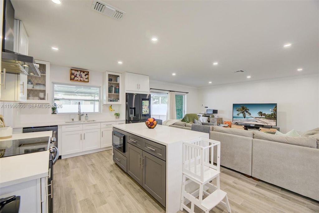 Photo of 8461 NW 16th St #8461, Pembroke Pines, FL 33024 (MLS # A11996105)