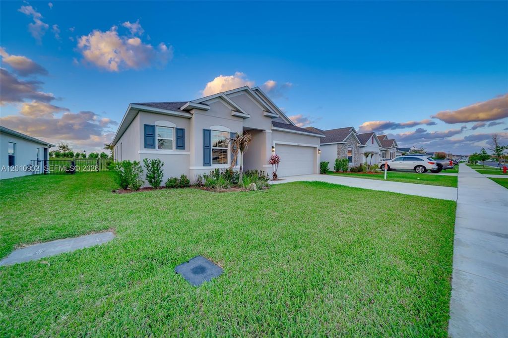 Photo of 12459 SW Forli Way, Port St Lucie, FL 34987 (MLS # A12010902)