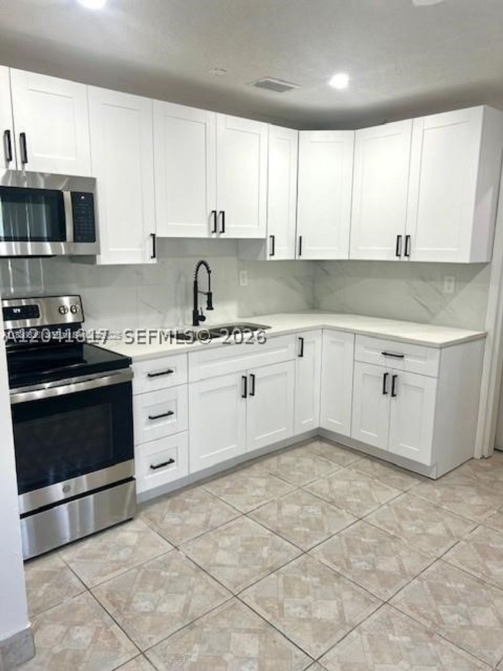 Photo of 1224 NW 19th Court #1, Fort Lauderdale, FL 33311 (MLS # A12041617)