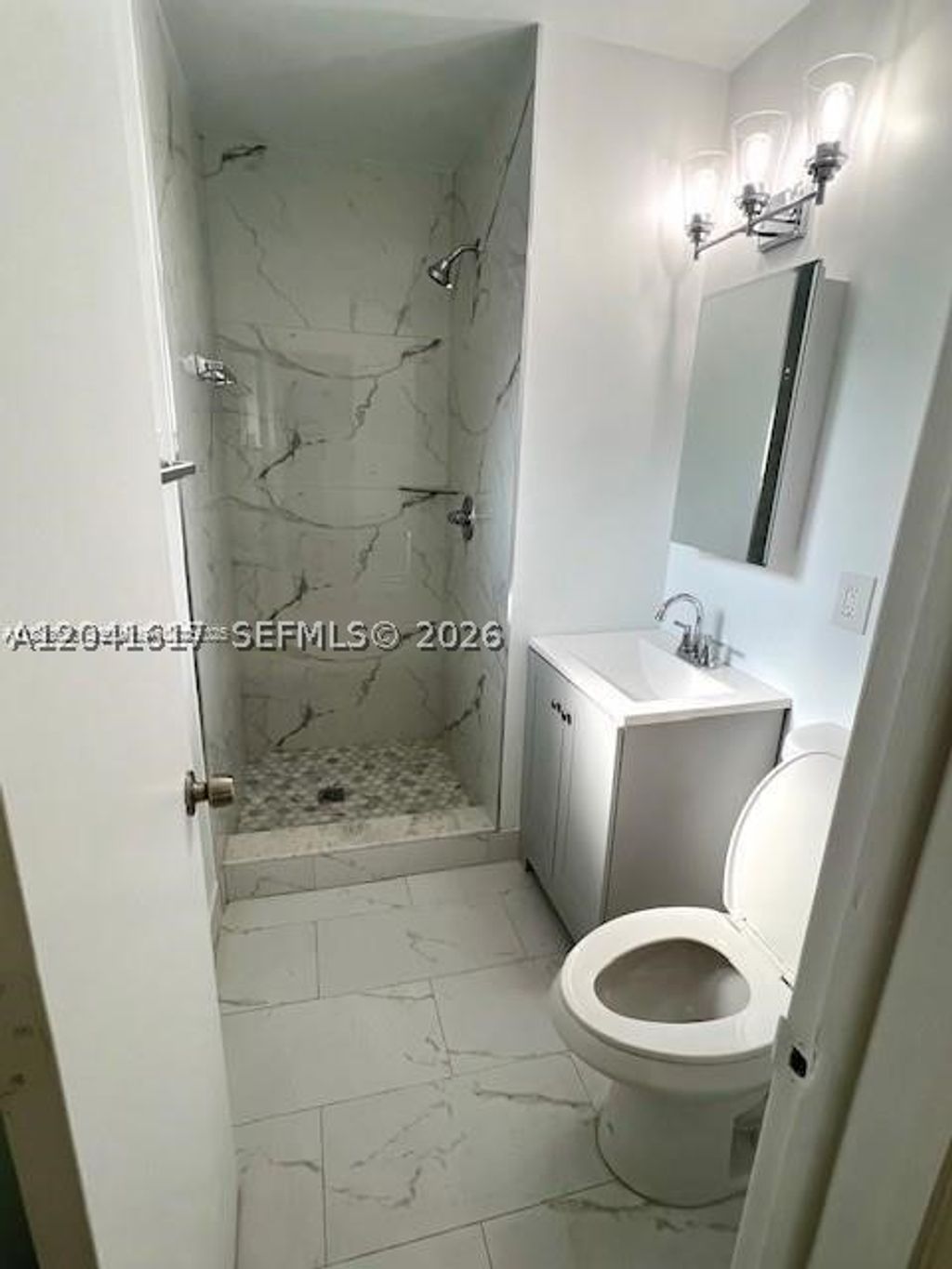 Photo of 1224 NW 19th Court #1, Fort Lauderdale, FL 33311 (MLS # A12041617)