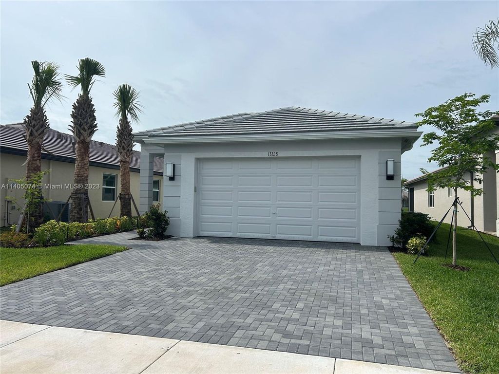 Photo of 13328 SW River Rock Rd #13328, Port Saint Lucie, FL 34987 (MLS # A11405074)