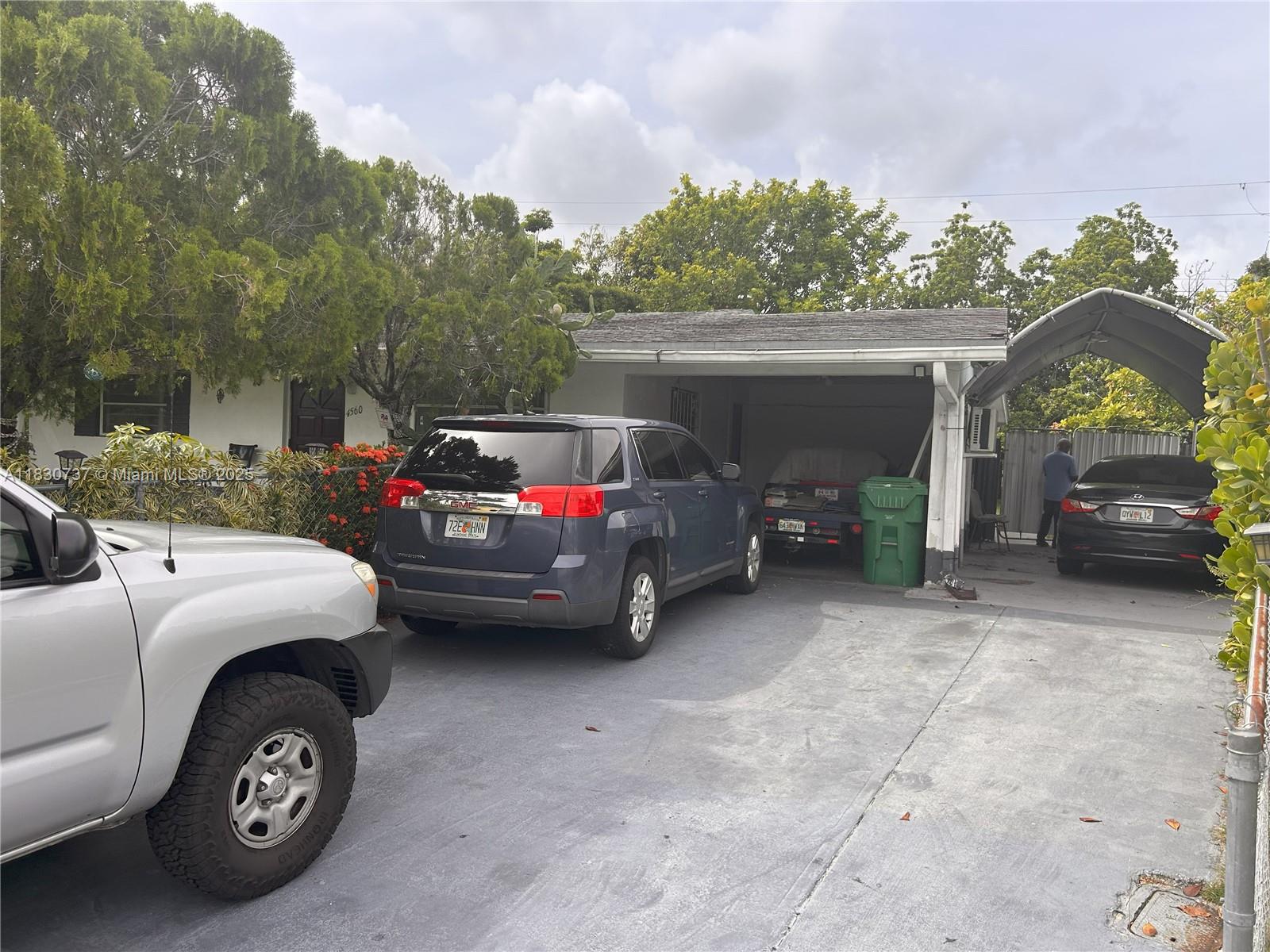 Welcome to this delightful 2-bedroom, 1-bath gem with a versatile converted garage—perfect for a guest suite, office, or creative studio. Brimming with potential, this home invites you to customize it to your taste. Enjoy sunlit living spaces, easy-care tile floors, and a generous backyard filled with lush fruit trees—ideal for entertaining, gardening, or relaxing in your private oasis. Nestled in a peaceful Lauderhill neighborhood near top schools, shops, and highways. A fantastic opportunity for first-time buyers or savvy investors!