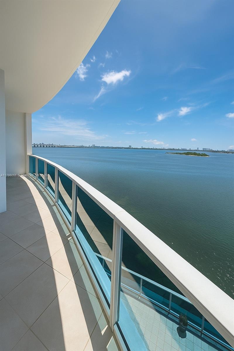 Rarely available, Luxury waterfront 2 bedroom corner with spectacular direct and unobstructed views of Biscayne Bay, the Ocean, Miami Beach and beyond, this SE CORNER unit offers 2 Beds / 2 Baths + DEN, 2 cover-assigned parking space (1 wired for EV), high ceilings and extra-large terrace perfect for entertaining, plus 2 additional balconies. Floor to ceiling impact resistant windows and sliding doors. This Kobi Karp Designed BOUTIQUE Building offers a bayside Pool with BBQ, Sunset Terrace, Gym overlooking the bay and 24-hr Concierge/ Security. Excellent location with easy access to Miami Beach, Downtown, Brickell, Wynwood, Design District and Miami International Airport. Truly a fantastic place.
