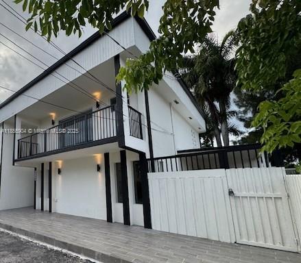 Canal-front Townhome Located in the Heart of Miami. HOA only $60 monthly. The property is redesigned as a 5 bed/3.5 bath, which includes a private in-law quarters perfectly designed for extended family members or ideal to generate rental-income. Kitchen features new cabinets, new appliances, and the property has two independent A/C systems for efficient energy consumption. The flat roof was recently recertified, and driveway accommodates up to 4 vehicles. The upstairs bedrooms feature private balconies with views to the canal, and stairs connect to a lower terrace. Property sits in a private community of 8 townhomes positioned with quick access to SR836, Downtown Miami, Miami International Airport and South Beach. This is a great home for a large family or the savvy investor.