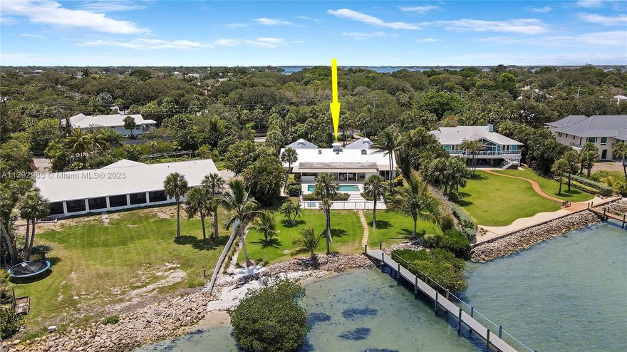 3659 square feet under air, updated and ready for you to enjoy! Beautiful wide waterfront home on North Sewall's Point. Private gated entry to this well-appointed home. Four bedrooms, four full baths and two half baths. Triple split plan with an additional office. Well thought out floor plan is a delight to entertain your friends and family. Beautiful view of the Indian River with spectacular sun rises. Dock with lift, impact windows, newer roof, pool, custom kitchen and a three-car garage complete the package! Come see it today.